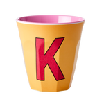 4122207-MELCU-ALPKI-RICE-Melaminbecher-mit-dem-Buchstaben-K-Apricot-Medium-250ml.png